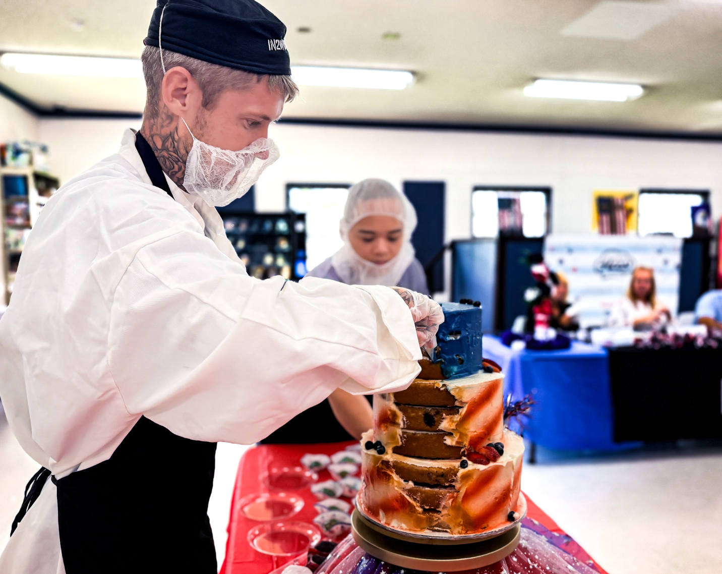 A man with a cake. 